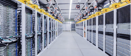 Server room showing computer racks on raised floor